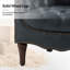 Fauteuil en cuir capitonné Annja-79522926