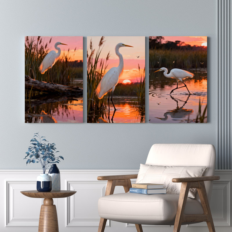 Ensemble de 3 tableaux sur toile tendue représentant un héron au coucher du soleil, H 30 po x l 60 po