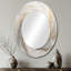 Miroir mural ovale grand format « Vortex V » à  ondulations douces dorées et blanches sur support métallique-1068288929