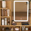 Table de coiffeuse compacte avec miroir lumineux à DEL, prise de courant, support pour sèche-cheveux et tabouret, idéale pour les petites chambres à coucher et l'organisation de cosmétiques
