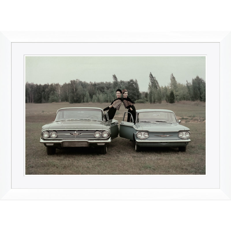 Vogue Magazine, "Two Women Leaning Out Of Cars," John Rawlings, November 1, 1959 Print by Condé Nast, 30" H x 41" W