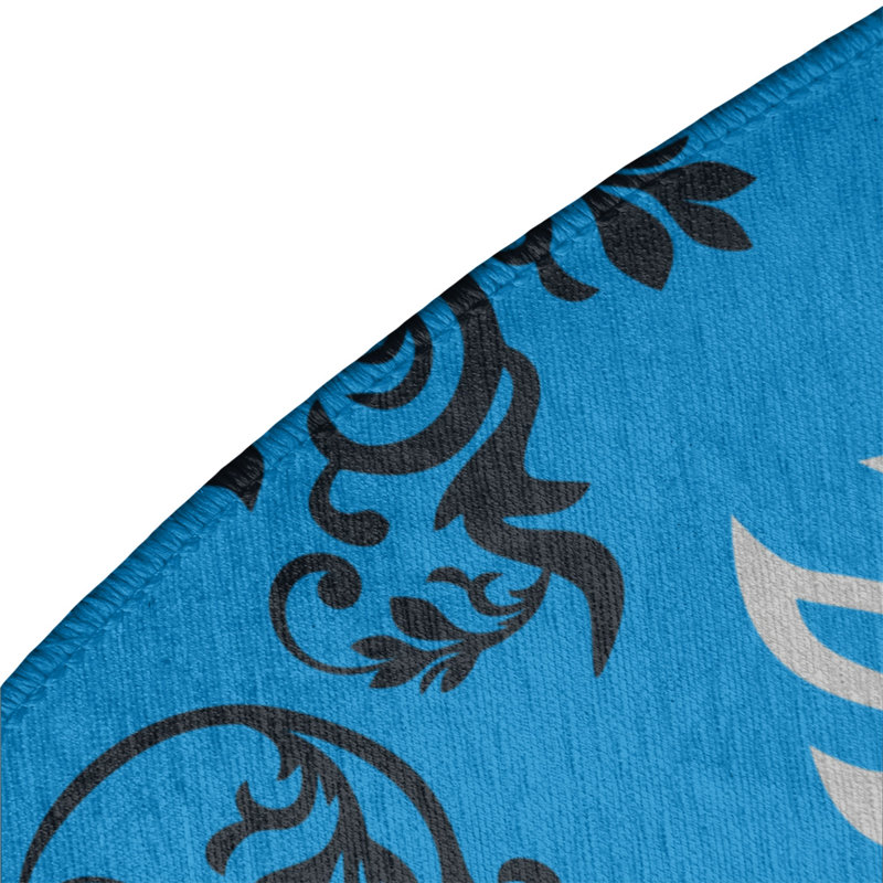 Tapis rond bleu damassé à motif baroque