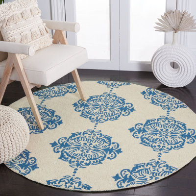 Tapis ivoire / bleu en laine crocheté à la main Daijah