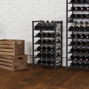https://assets.wfcdn.com/im/81391841/resize-h310-w310%5Ecompr-r85/1517/151741030/24-bottle-metal-floor-wine-bottle-rack-in-black.jpg