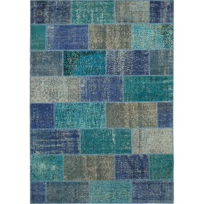 Tapis bleu en coton noué à la main