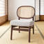 Fauteuil rembourré à dossier en rotin-2070853279