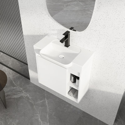Meuble-lavabo mural moderne de 61 cm (24 po), lavabo en céramique blanche, charnières à fermeture douce, fini lustré, deux espaces de rangement ouverts. Meuble-lavabo blanc, porte fermée, emballage démontable.
