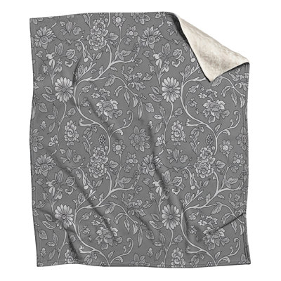Couvertures à motif floral gris