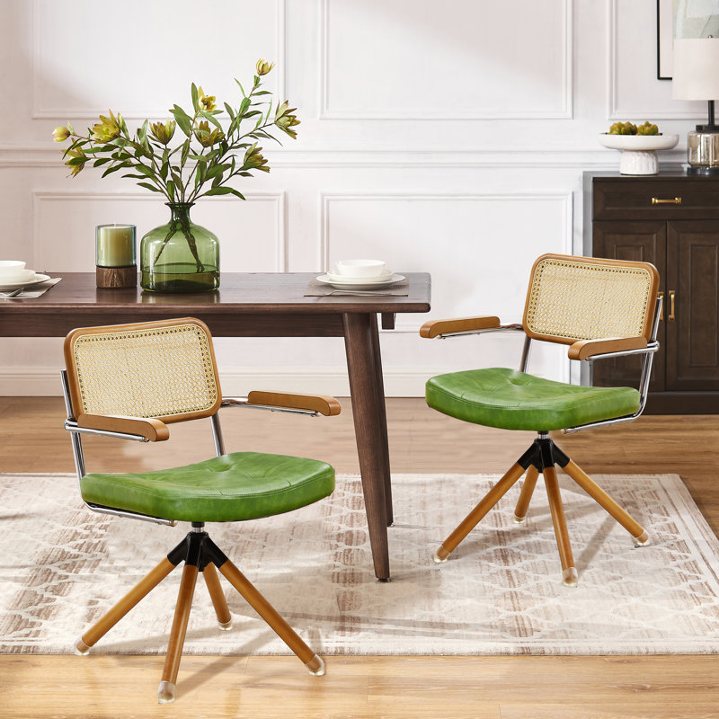 Beorn 19.69'' W Swivel Ratten Back PU Leather Upholstered Dining Arm Chair, Green Faux Leather