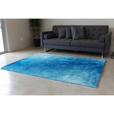 Tapis de zone bleu abstrait Filebrook