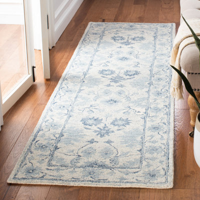Lethe Oriental Handmade Tufted Wool Blue/Ivory Area Rug