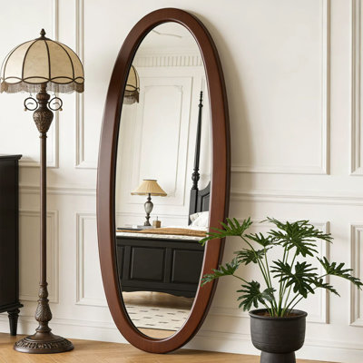 Miroirs ovales en bois manufacturé