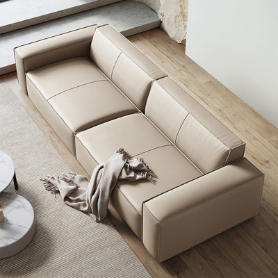 Canapé modulaire beige en cuir véritable