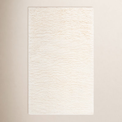 Abriel Ivory Solid Hand-Woven Wool Rug