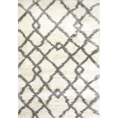 Carrasquillo Geometric Indoor Rug
