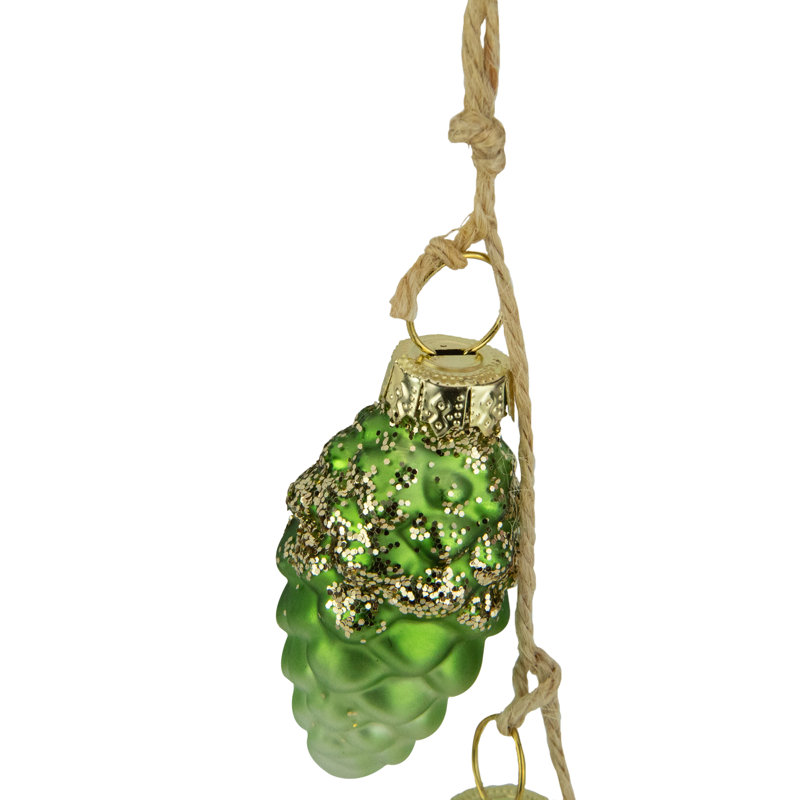 Ornement en forme de pomme de pin verte et blanche 7 po