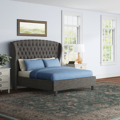 Alaijha Upholstered Wingback Bed