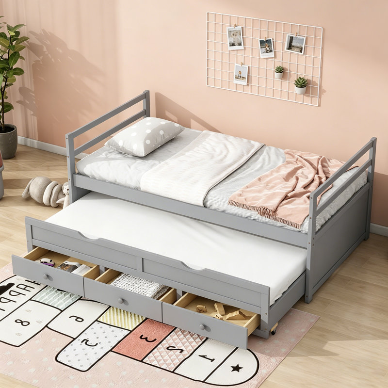 Lit simple en bois de pin avec tête de lit, pied de lit, lit gigogne et trois tiroirs de rangement en gris, parfait pour économiser de l'espace et accueillir des invités.