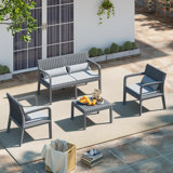 Ensemble de conversation d'extérieur 4 personnes avec coussins et table basse