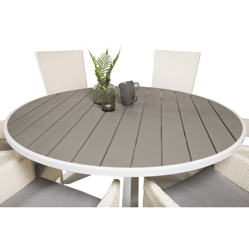 Akia 6 - Person Patio Dining Set with Round Table , Cushions Included