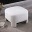 Repose-pieds en sherpa blanc