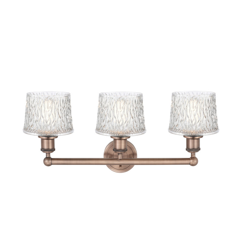 Éclairage pour meuble-lavabo de salle de bain 3 lumières 24,5 pouces Pascaline, Cuivre antique
