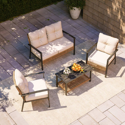 Aljaquan Wicker 4 - Person Patio Conversation Set with Cushions