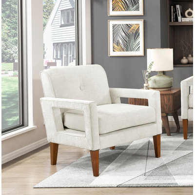 Fauteuil de salon moderne avec revêtement en chenille beige, ressorts ensachés et pieds pour plus de confort et de style