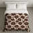 Motif floral brun / beige