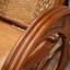 Chaise berçante confortable en rotin