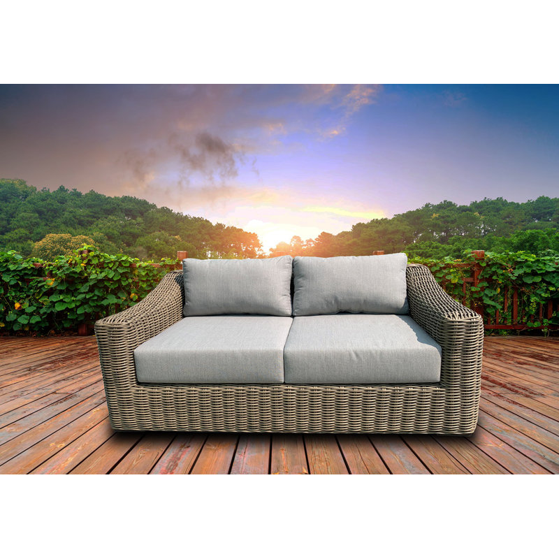 Causeuse de patio avec coussins
