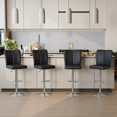 Ensemble de tabourets de bar modernes en polyuréthane - 2 pièces, avec des dossiers verticaux et lisses avec des pieds en métal argenté en forme de trompette. Idéal pour les bars, les salons, les salons et autres espaces similaires.