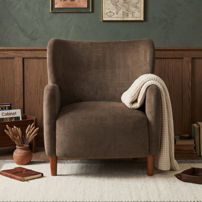 Fauteuil club à oreilles avec revêtement en velours moelleux et pieds en bouleau massif