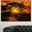 Coucher de soleil africain avec arbre solitaire, reproduction de photo en vert-971741479-965856237