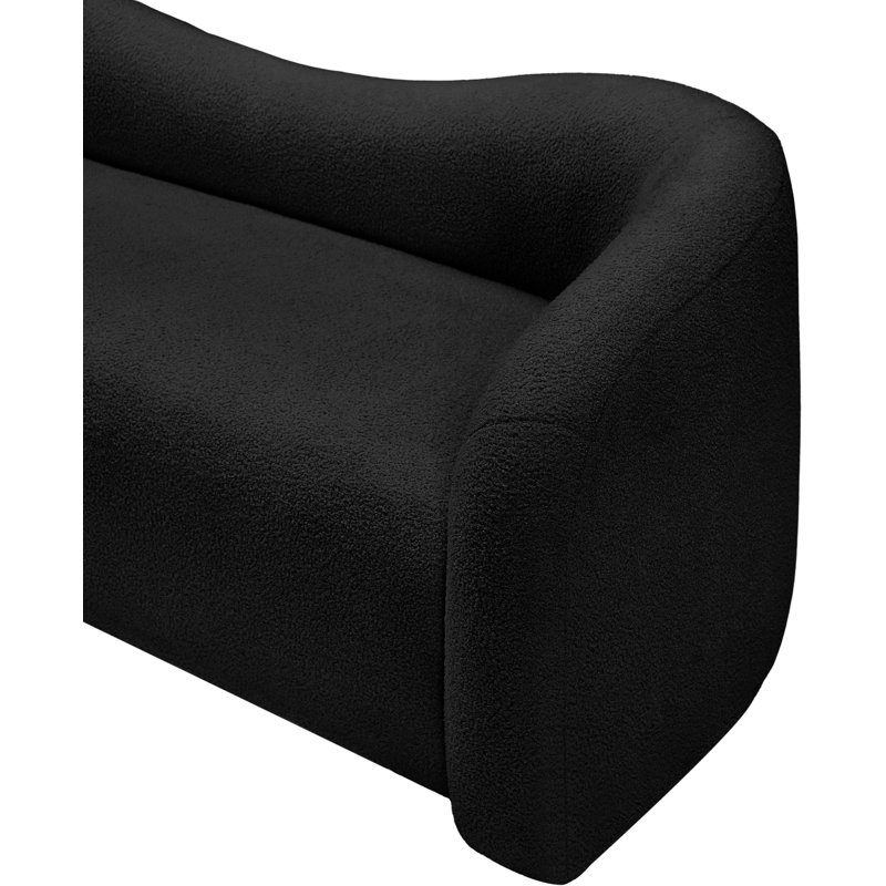 Causeuse rembourrée Kali, Tissu noir en fausse peau de mouton