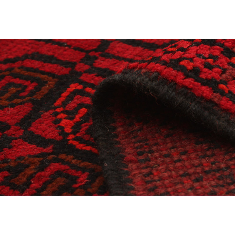 Tapis rouge en laine noué à la main