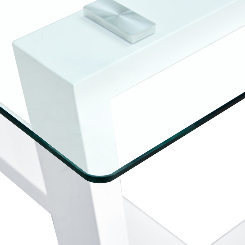 Élégante table en verre trempé avec base blanche robuste, pouvant accueillir de 6 à 8 personnes et une table de salle à manger