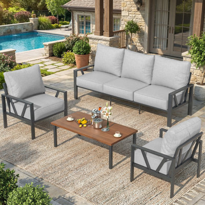 5 - Person Outdoor Seating Group With Cushions And Coffee Table
