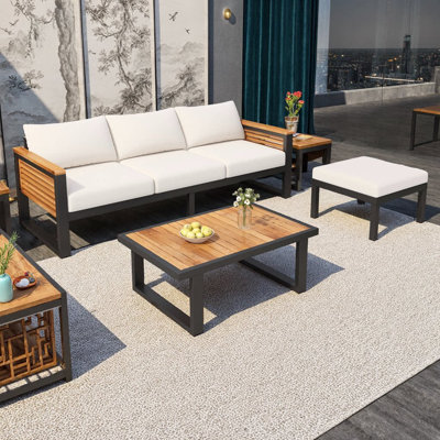 Ensemble de canapé d'extérieur 3 pièces en bois d'acacia et métal | Sièges de style industriel avec canapé 3 places, repose-pieds et table basse | Mobilier résistant aux intempéries avec coussins moelleux pour le jardin, la terrasse ou le balcon