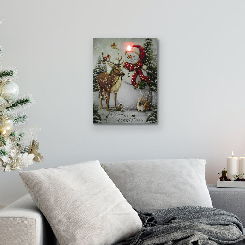 Bonhomme de neige illuminé et renne de Noël