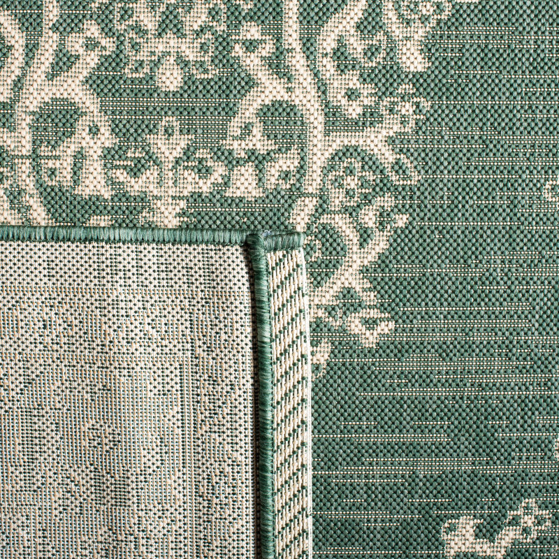 Courtyard Chic Dark Green and Beige 9' x 12' Synthetic Outdoor Rug