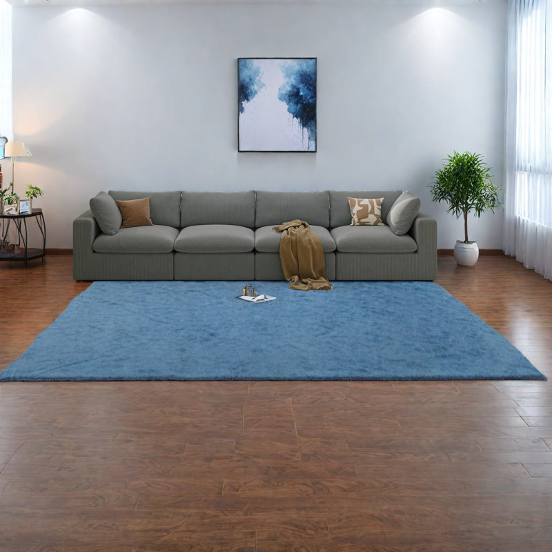 Grand canapé modulaire avec revêtement en velours côtelé, confort moderne en forme de L