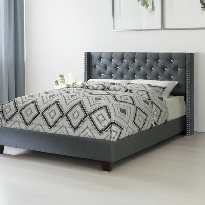 Grand lit en bleu gris