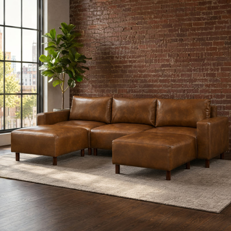 Canapé trois places Modulair moderne et luxueux avec deux poufs, recouvert de cuir PU respirant et doté d'une structure en bois massif.