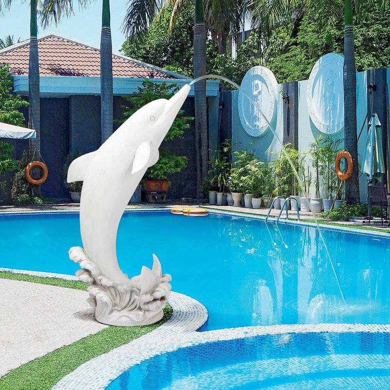 Statue de dauphin tropical sautant