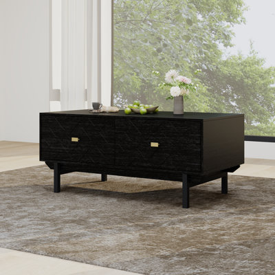 Black MDF Coffee Table With 4 Drawers And Geometric Front Panels, Gold Handles, And Metal Legs