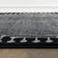 Tapis moderne noir et crème à motif géométrique-72566758