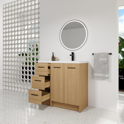 Meuble-lavabo 36 po avec lavabo en résine, deux portes et deux tiroirs