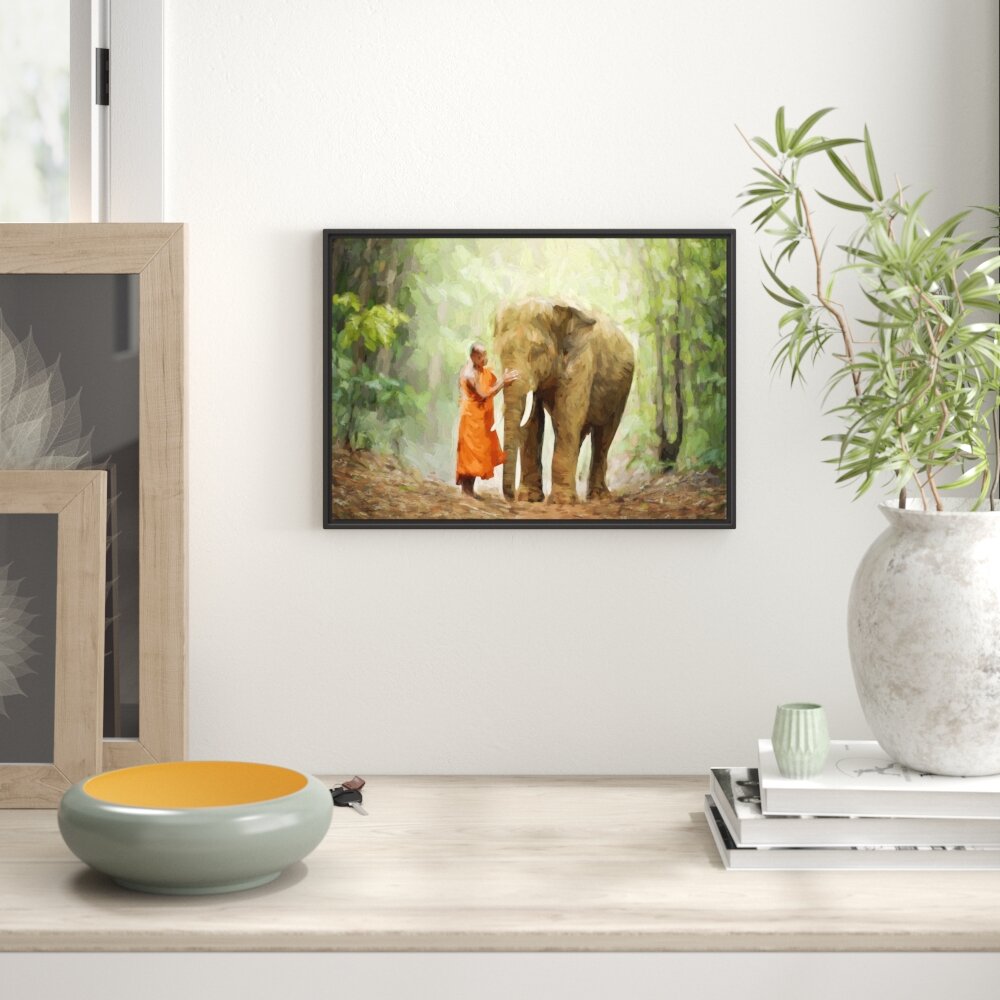 Gerahmtes Wandbild Elefant mit Mönch