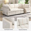 Canapé beige en chenille à accoudoirs carrés